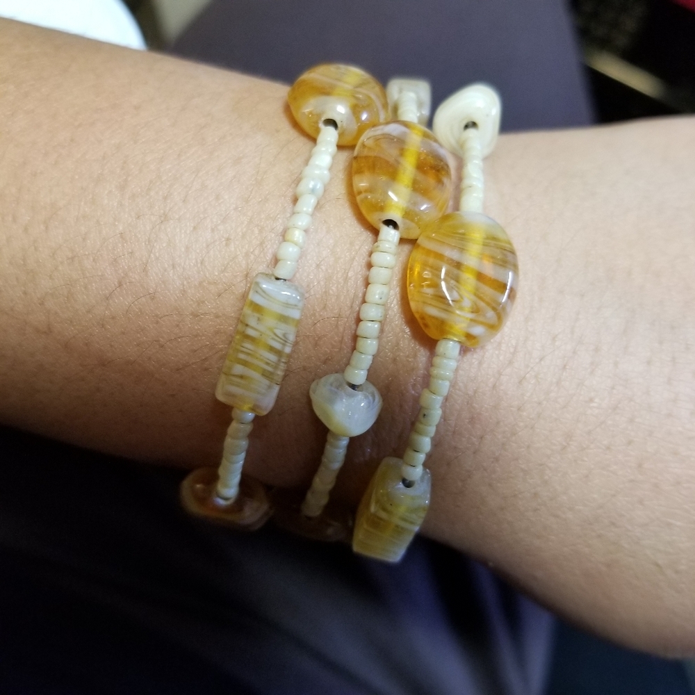 Beaded stretch neutral brown 3 layer boho bracelet.
